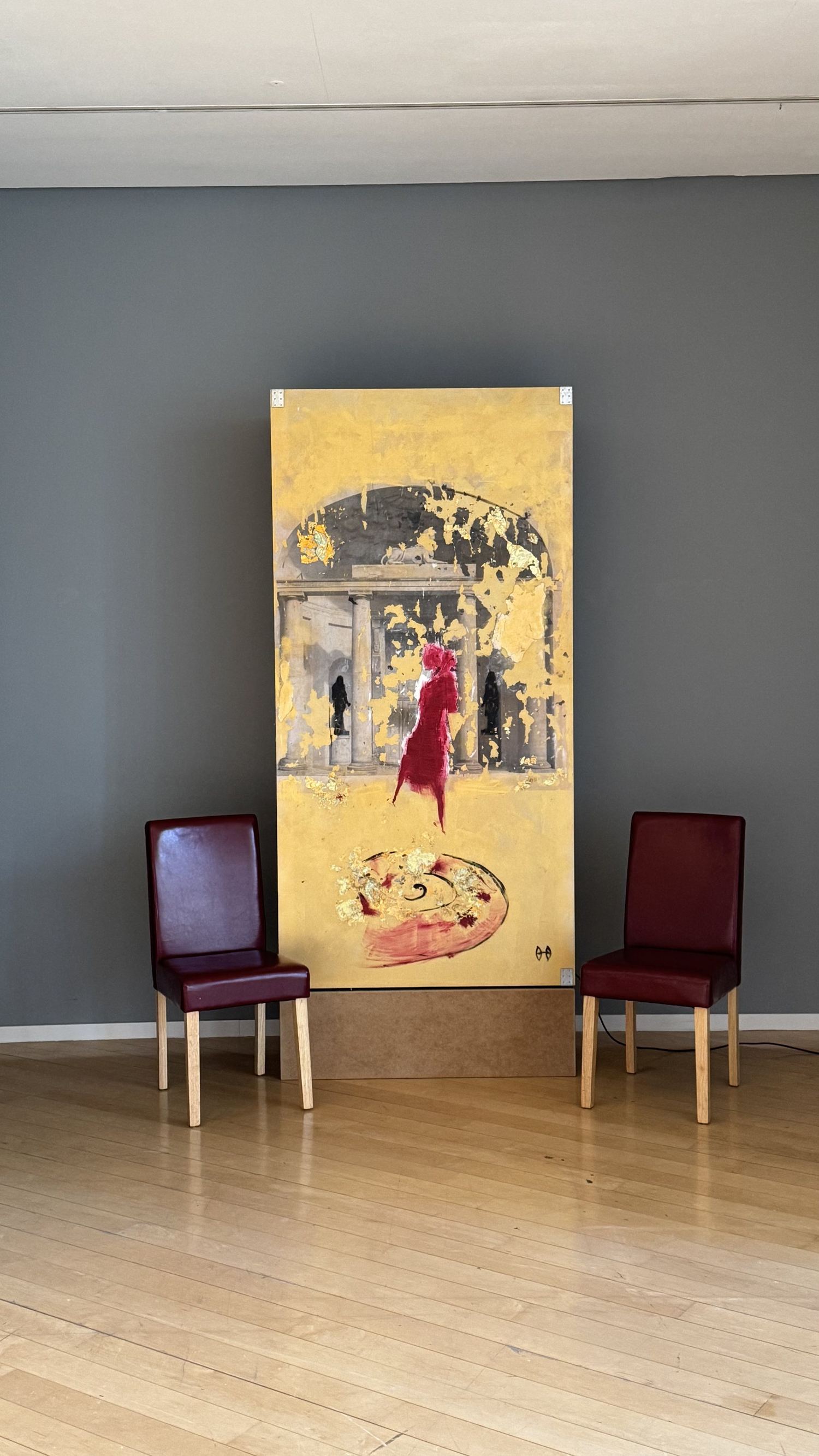 Entering the Temple by Susanne Rikus (transfer art on acrylic glass, 2012) — installation view with two red chairs